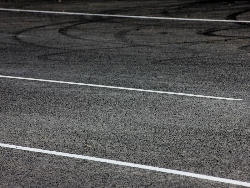 Commercial asphalt parking lot with painted line markings