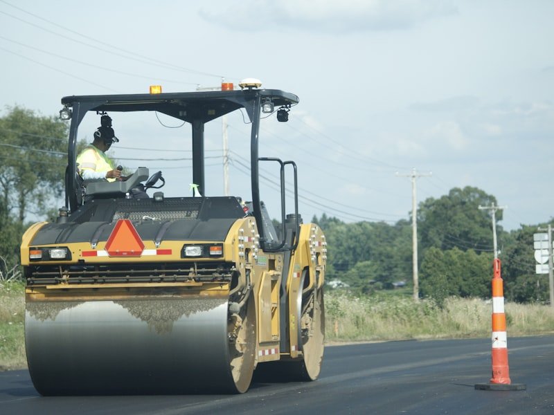 Paver laying a new asphalt driveway surface